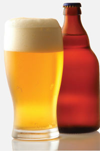 Pilsner glass and beer bottle